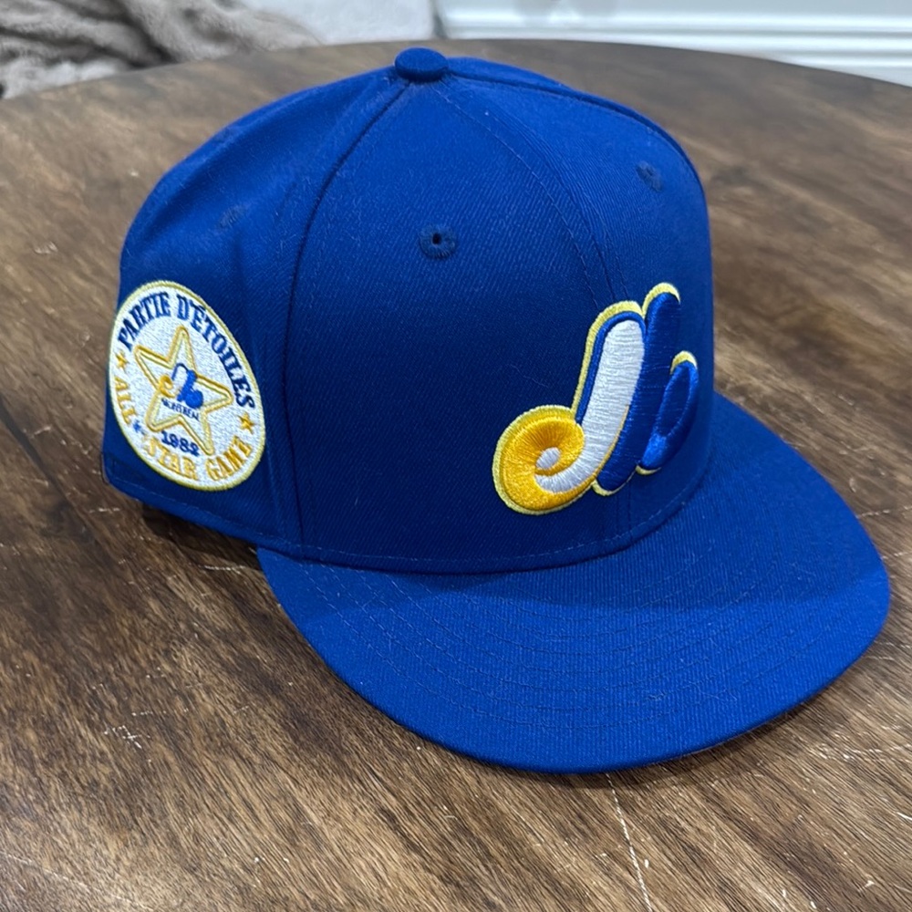 Blue Baseball Cap with Yellow and White Logo